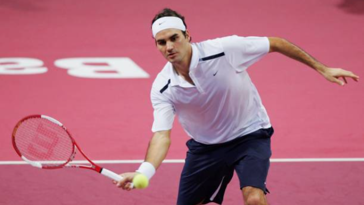 Roger Federer y la extinta moqueta. Foto: gettyimages