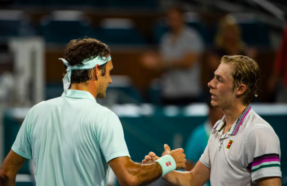 Denis Shapovalov and Roger Federer in the match they had a few years ago. Source: Getty