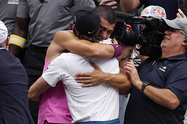 Ferrero y Alcaraz, abrazados tras conseguir el US Open.