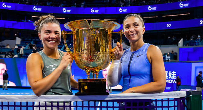 Sara Errani and Jasmine Paolini pose with the title in Beijing. Source: Getty