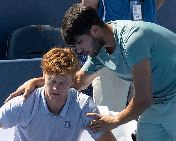 Alcaraz consoling Sinner