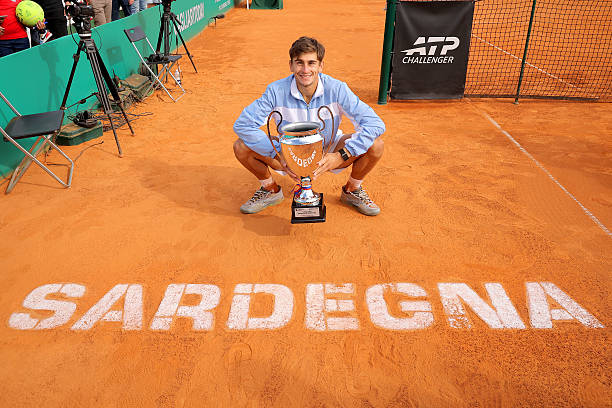 Arnaldi posing with the champion's title in Cagliari. Source: Getty