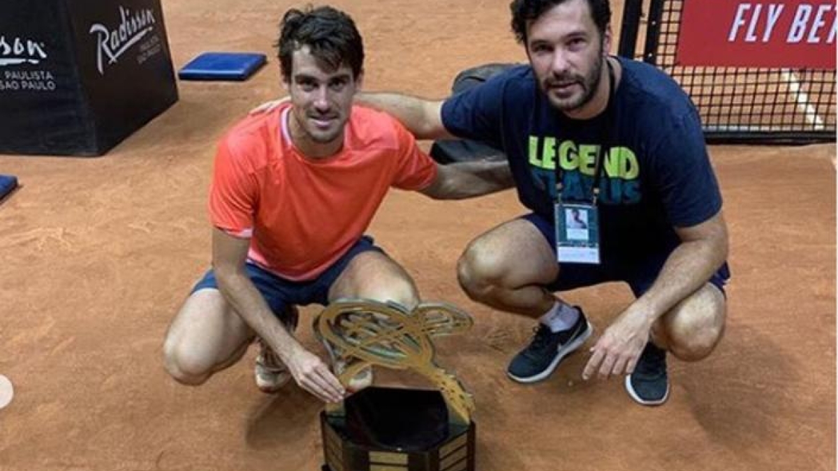 Pella y Acasuso con el título en Sao Paulo. Fuente: La Nación