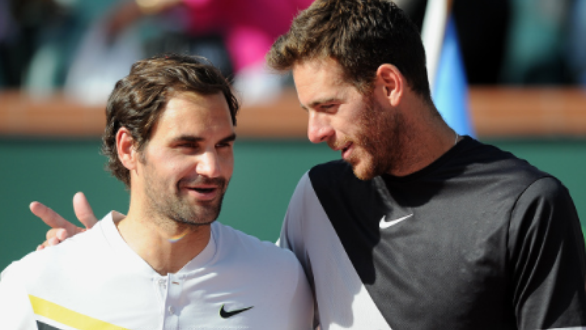 Roger Federer aconseja a Del Potro. Foto: gettyimages