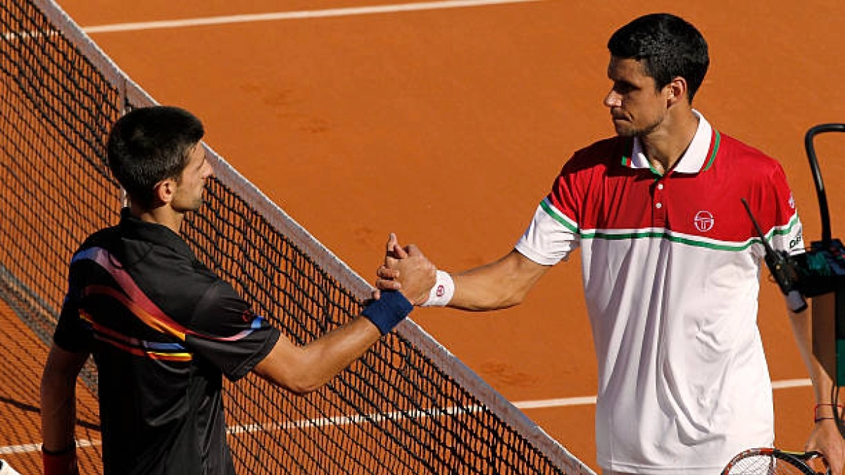 Hanescu y Djokovic. Fuente: Getty