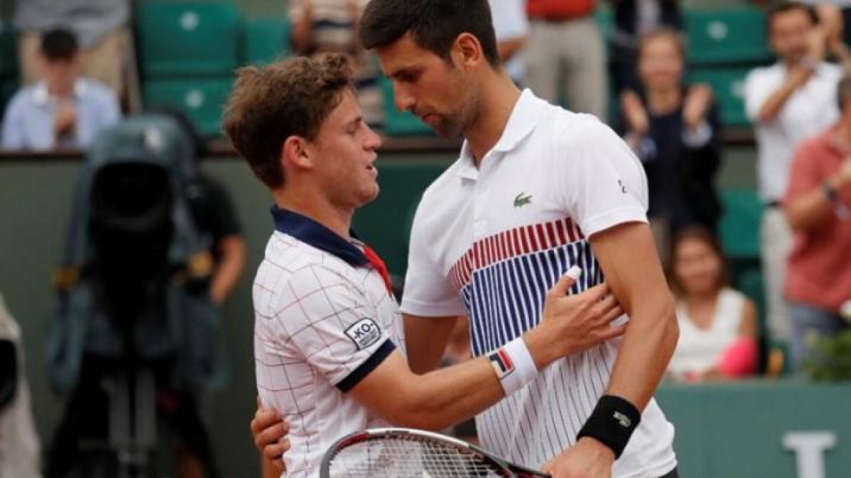 Diego Schwartzman y Novak Djokovic. Foto: Roma