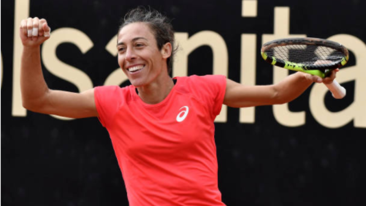 Schiavone celebra en uno de sus últimos torneos como profesional. Fuente: Getty