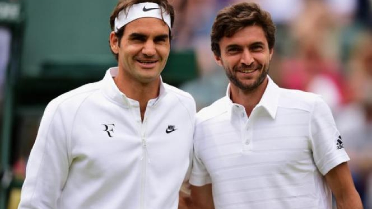 Roger Federer y Gilles Simon Foto: Getty