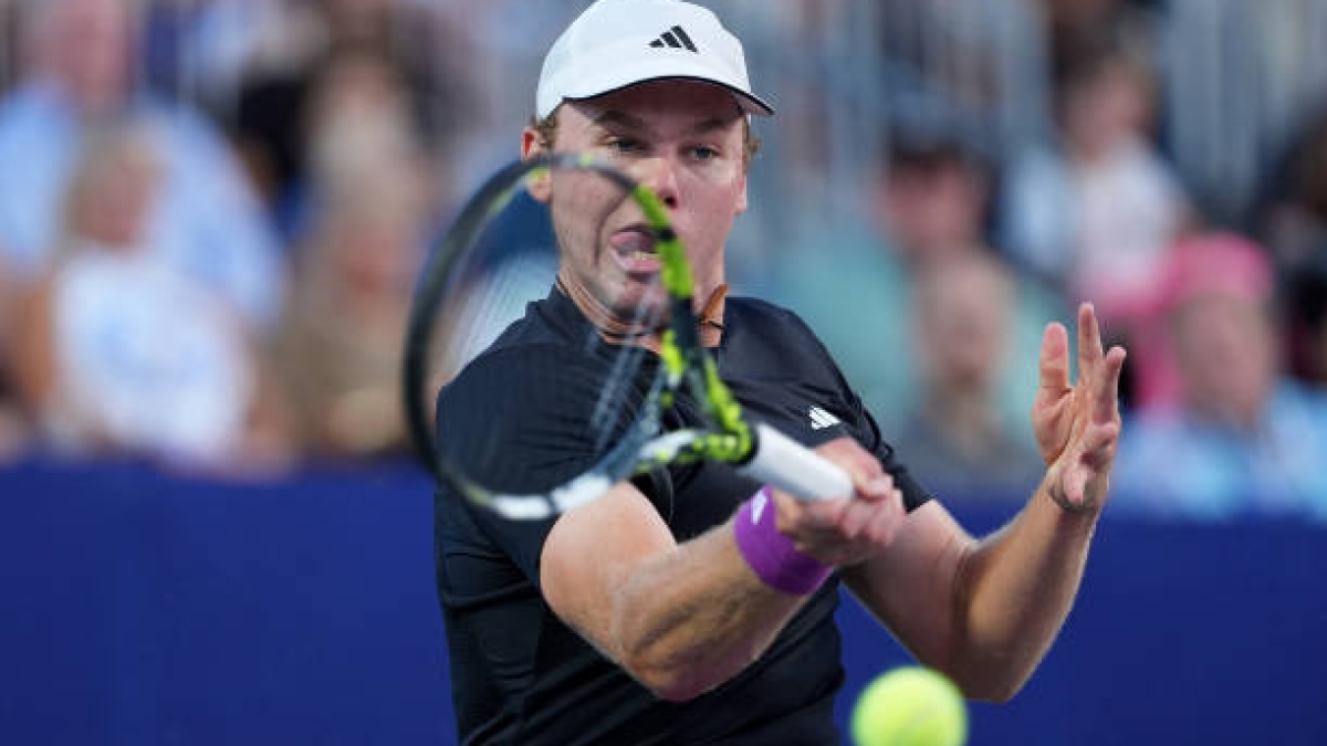 Alex Michelsen hits a spectator when throwing a ball in anger. Photo: Getty