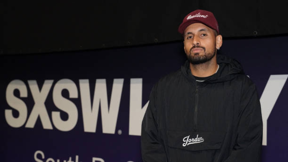 Nick Kyrgios returns in Brisbane. Photo: Getty Images.