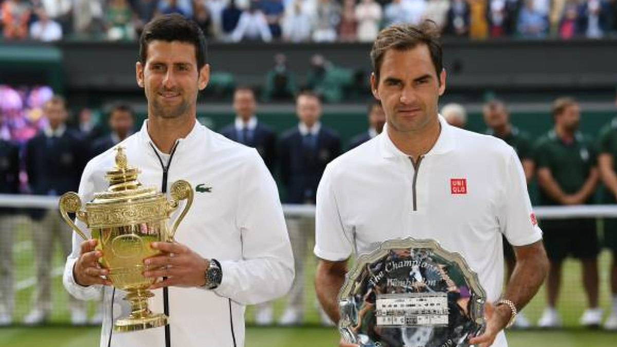 Novak Djokovic and Roger Federer at Wimbledon 2019. Photo: getty