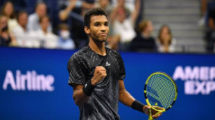 Aliassime sonríe tras acceder a cuartos. Fuente: Getty