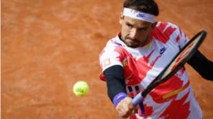 Grigor Dimitrov lanza el revés cortado. Fuente: Getty
