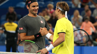 Federer y Ferrer tras finalizar un duelo. Fuente: Getty.