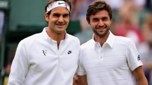 Roger Federer y Gilles Simon Foto: Getty