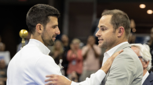 Novak Djokovic y Andy Roddick. Foto: Getty