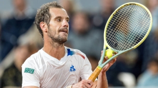 Richard Gasquet y una llama que casi apaga. Fuente: Getty