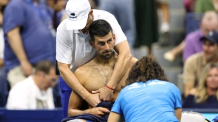 Novak Djokovic being treated for stomach issue at the US Open 2024. Photo: Getty