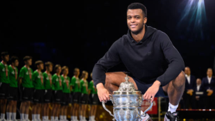 Giovanni Mpetschi Perricard with the title of Basel. Photo: Getty