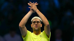 卡洛斯·阿尔卡拉斯评价与亚历克斯·德·明纳尔的精彩比赛。来源：Getty