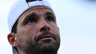 Dimitrov rompe a llorar tras volver a ganar en Wimbledon. Fuente: Getty Images.