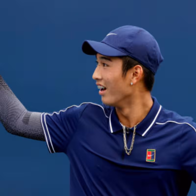 Juncheng Shang en uno de sus partidos   Fuente: Getty