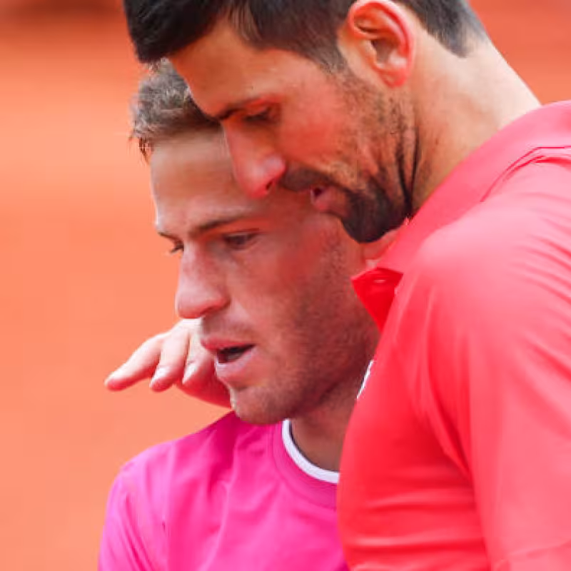 Novak Djokovic and Diego Schwartzman at Roland Garros 2022. Photo: Getty