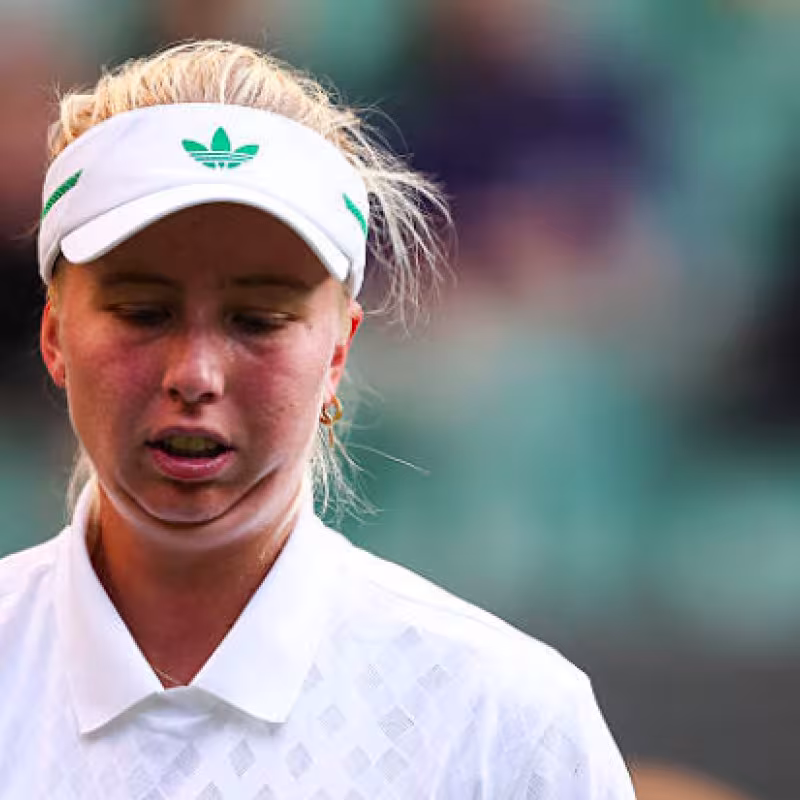 Clara Tauson explains what it feels like to play against Swiatek. Source: Getty