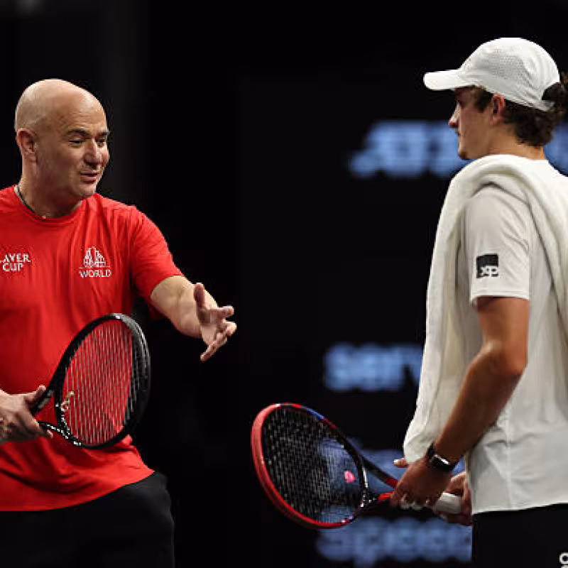 Andre Agassi, mentoring Joao Fonseca in one of the early Laver training sessions. Source: Getty