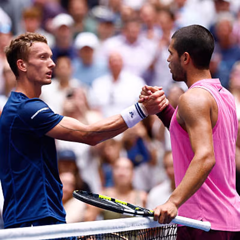 Lehecka greets Alcaraz after the defeat in New York. Source: Getty