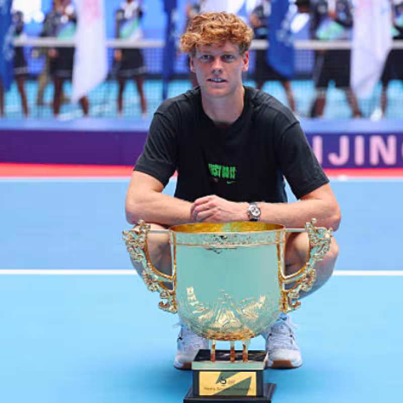 Jannik Sinner with his champion title in Beijing. Source: Getty