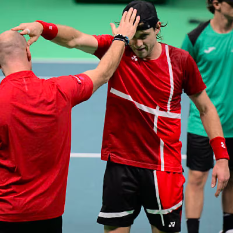 Steve Darcis proudly celebrates his boys' victory in the Davis Cup. Source: Getty