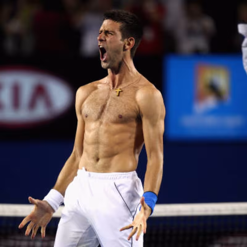 Djokovic celebrates his victory against Nadal at the Australian Open 2012. Source: Getty