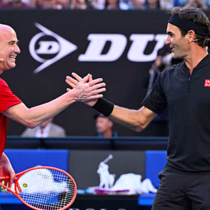 Andre Agassi and Roger Federer have a blast at the Australian Open 2026. Source: Getty