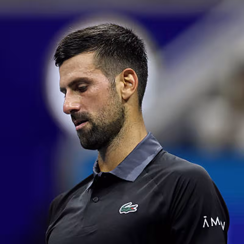 Djokovic vomita durante su partido contra Navone en el US Open. Fuente: Getty Images.